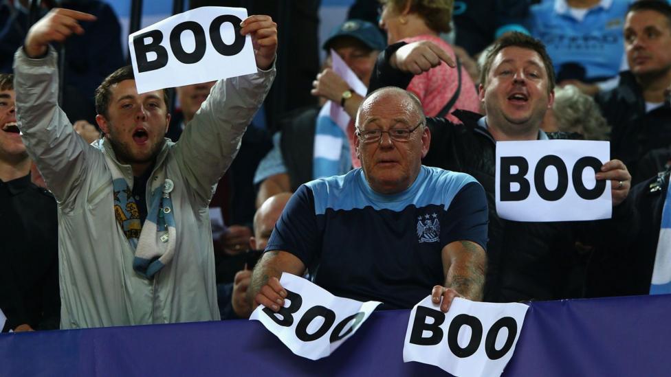 Why do Man City fans boo pre-match anthems?