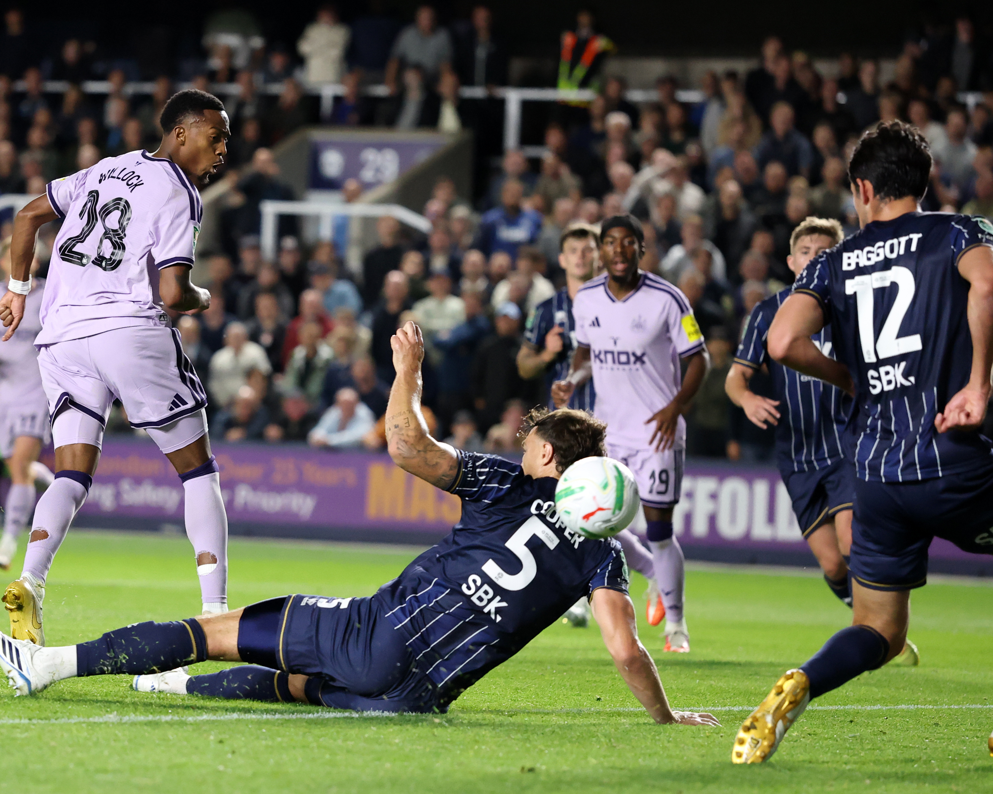 Newcastle progress as Joe Willock strikes late to see off Millwall
