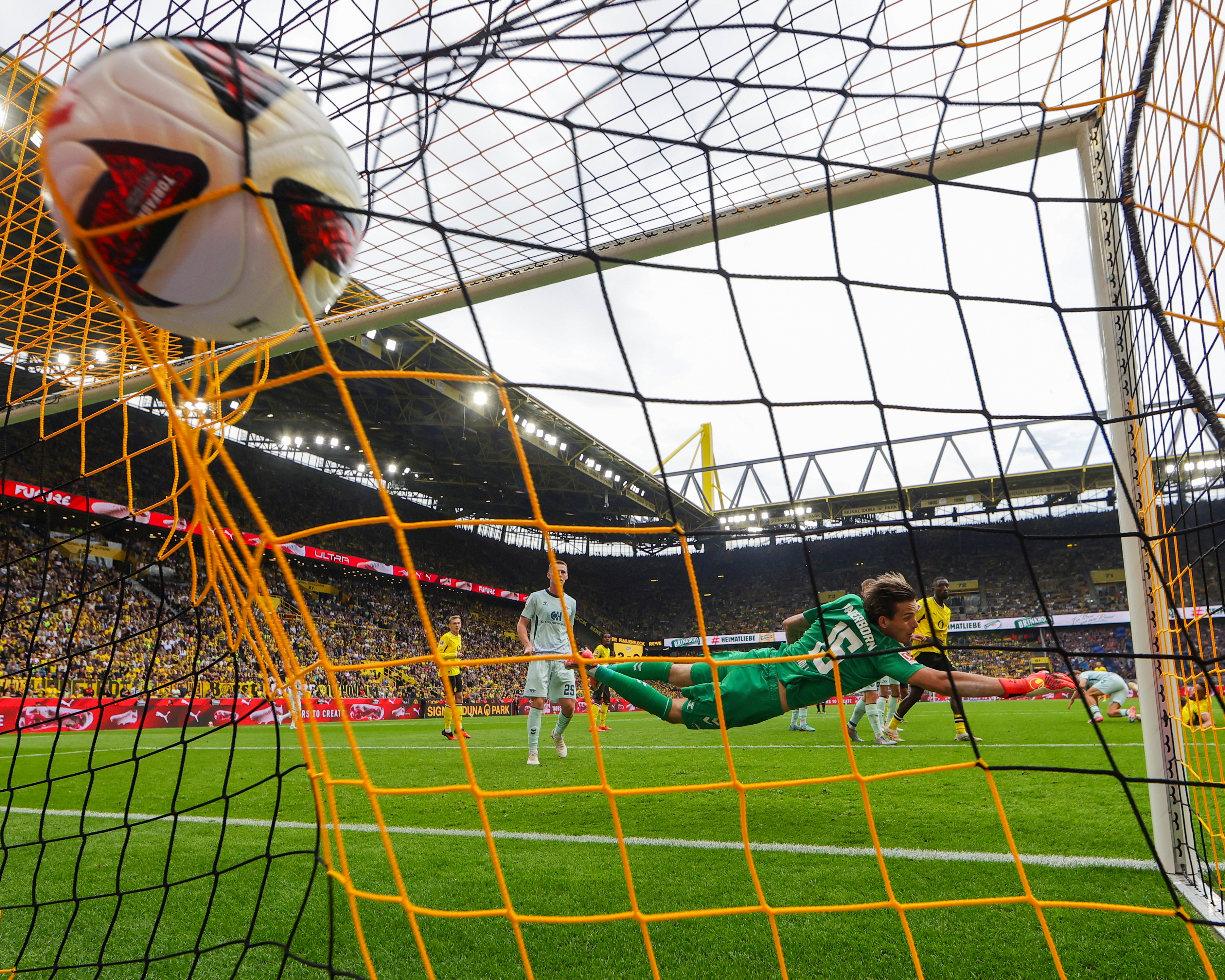 European football: Dortmund win again but Freiburg top after Gladbach rout